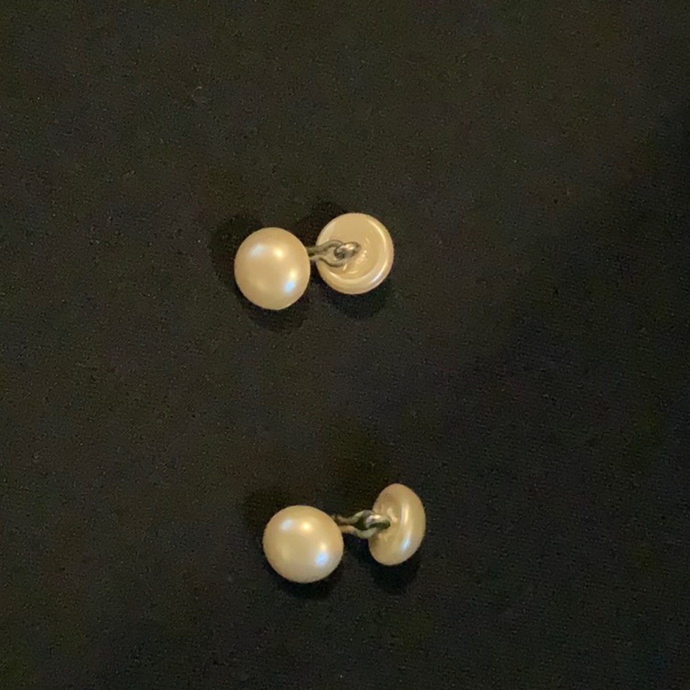 Cuff links.